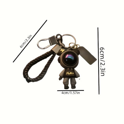Cute Astronaut Keychains: Lightning & Cartoon Spaceman Designs For Couples, Silicone Style With Red Helmets, And Crystal-Embellished Alloy Versions - Maximus Echo