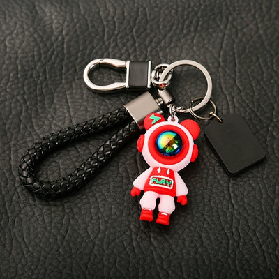 Cute Astronaut Keychains: Lightning & Cartoon Spaceman Designs For Couples, Silicone Style With Red Helmets, And Crystal-Embellished Alloy Versions - Maximus Echo